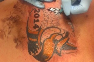 Get a hawthorn 3peat tattoo