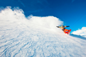 Learn to snowboard in a foreign country