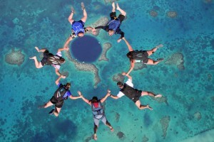 Skydive into Belize’s Big Blue Hole.