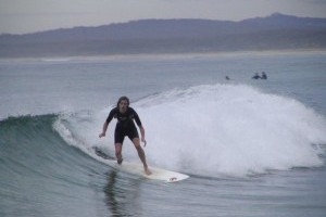 own a house on the beach, and catch a wave every single day.