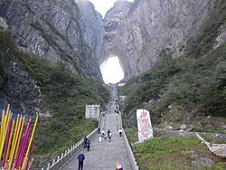 fly a Wing suit through the arch in the tianmen mountains