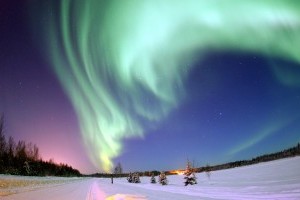 lie in the snow and watch the Northern Lights