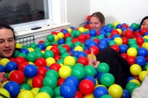 hire enough plastic balls to create a giant ball pit