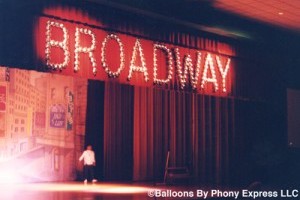 Perform on a Broadway stage