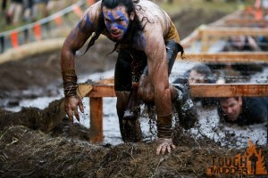 participate and complete a Tough Mudder