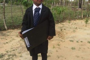 Dina, dressed as a lawyer for his school in Srilanka